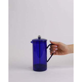 Chic hand gripping blue French Press | Domestique