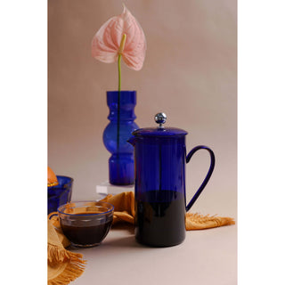 Doestique blue french press with orange pleasure and practical made to be displayed and use everyday